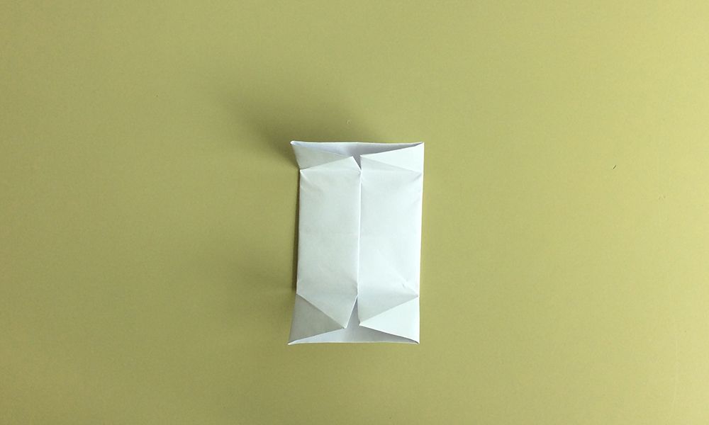 14. Päästä ohjeen 12 ja 13 taitokset irti.